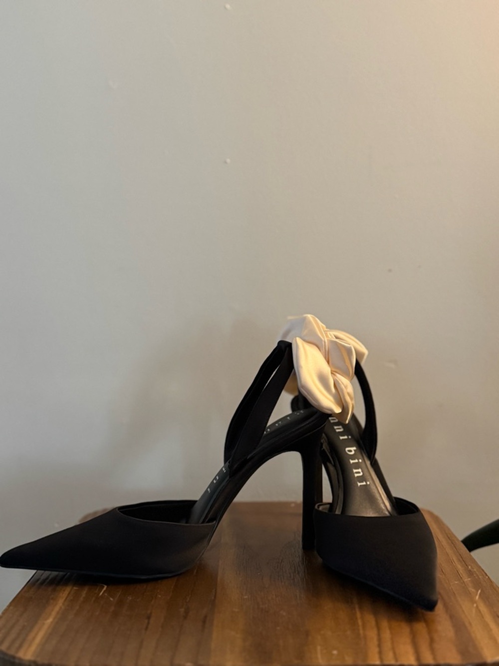 Black Pointed-Toe Heels with Cream Bow Accent - Women